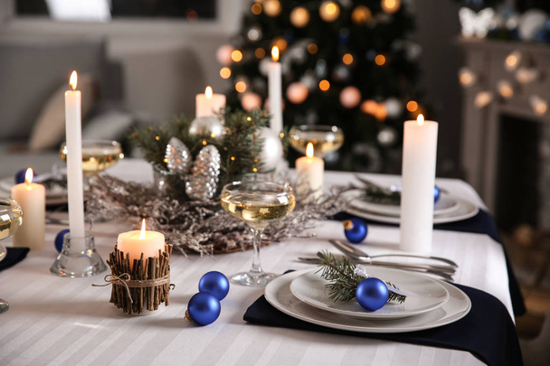 Beautiful table setting for Christmas dinner - Фото, изображение