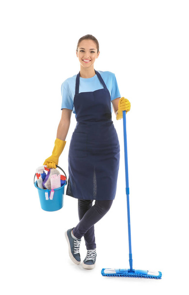Woman with cleaning supplies on white background - Fotó, kép