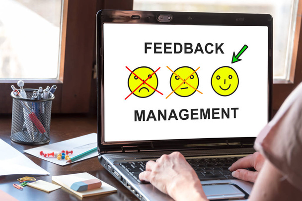Laptop screen displaying a feedback management concept - Photo, Image