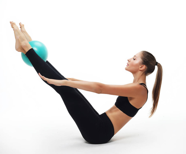 Athletic woman doing exercise with medicine ball. - Valokuva, kuva