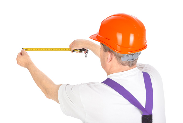 manual worker with tape measure - Foto, Imagen