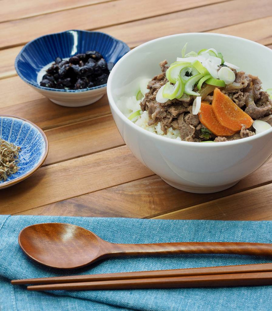 Asian food Bulgogi with Rice, A bowl of rice topped with bulgogi - Photo, Image