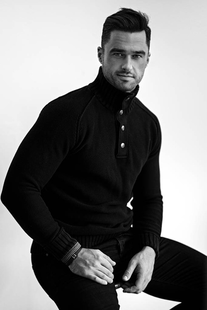 Portrait of handsome man in black turtleneck jumper isolated on white background - Foto, Imagem