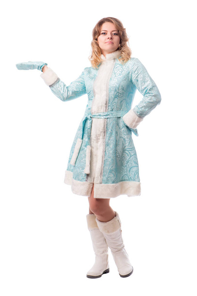 Girl dressed in a snow maiden costume, blue dress, posing on a white background - Foto, imagen