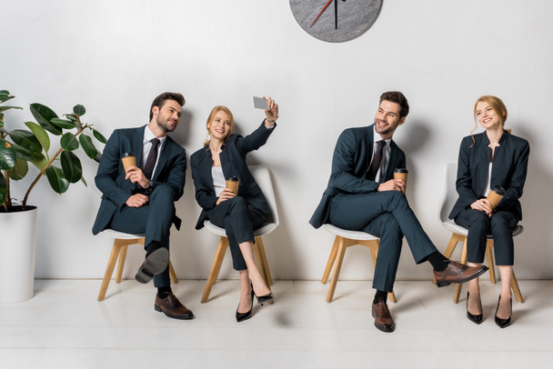 collage of smiling young business people with smartphone and paper cups waiting on chairs in line - Photo, image