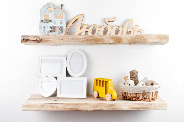 Wooden shelves with decor items. Home interior - Fotoğraf, Görsel