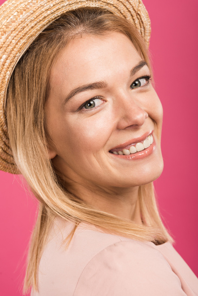 attractive blonde woman in straw hat, isolated on pink - Foto, immagini