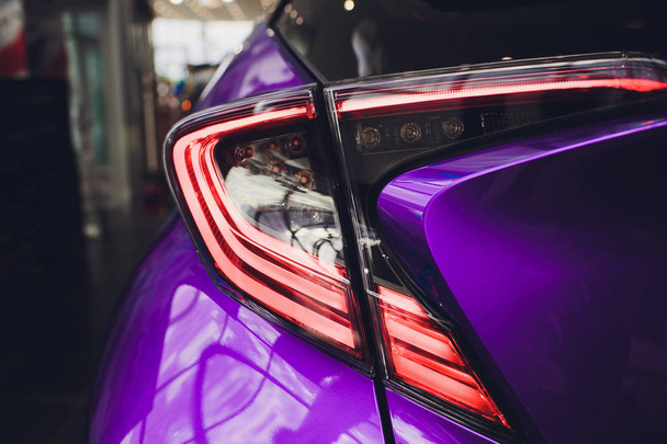 Detail on rear light blue car purple - Foto, imagen