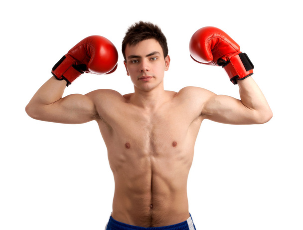 Portrait of boxer showing his muscles. - Foto, afbeelding