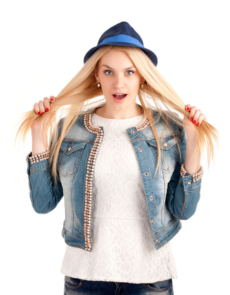 Portrait of young woman in blue hat - Fotoğraf, Görsel