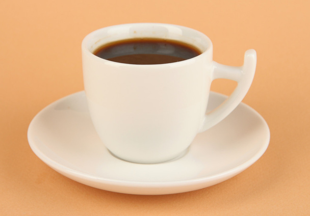 Cup of strong coffee on beige background - Fotografie, Obrázek