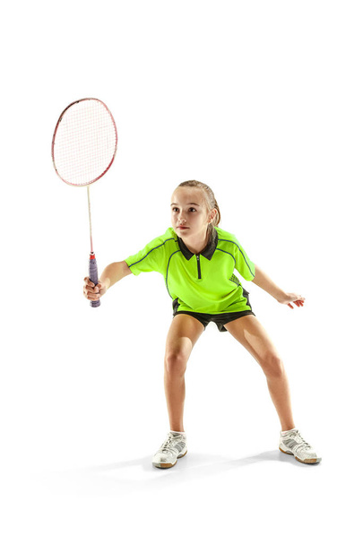 one caucasian young teenager girl woman playing Badminton player isolated on white background - Φωτογραφία, εικόνα