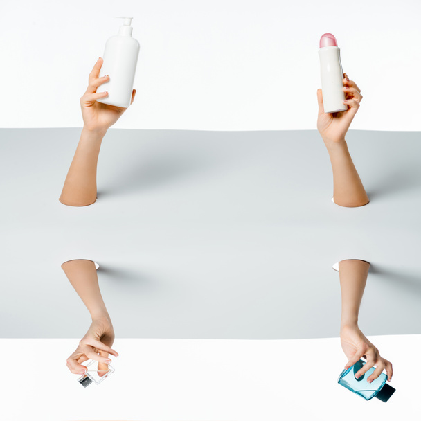 cropped shot of women holding beauty products through holes on white  - Zdjęcie, obraz