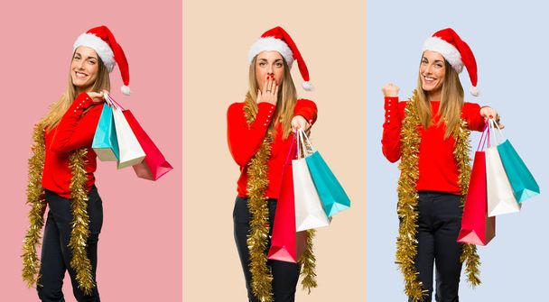 Set van Blonde vrouw verkleed voor de kerstvakantie verrast terwijl een heleboel boodschappentassen - Foto, afbeelding