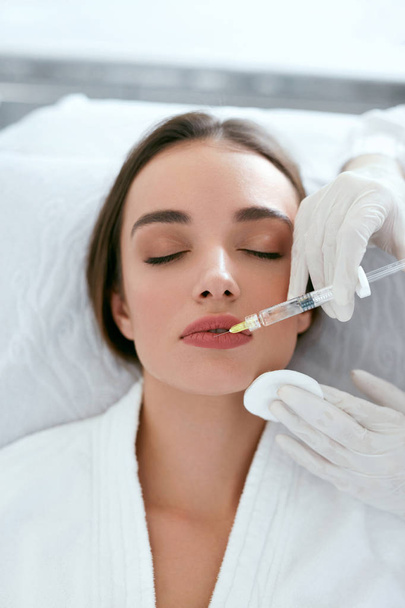 Lip Augmentation. Woman Getting Beauty Injection For Lips - 写真・画像