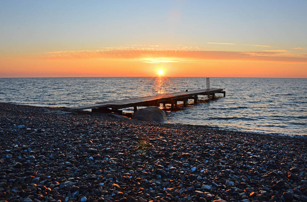 Sunrise egy üres tengerparton, a sziget Fehmarn, Németország - Fotó, kép