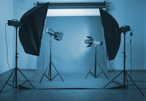 Photo studio with lighting equipment - Foto, Imagen