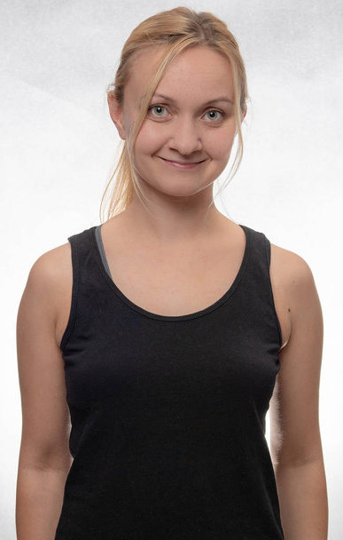 portrait of young woman in black tank top - Foto, immagini