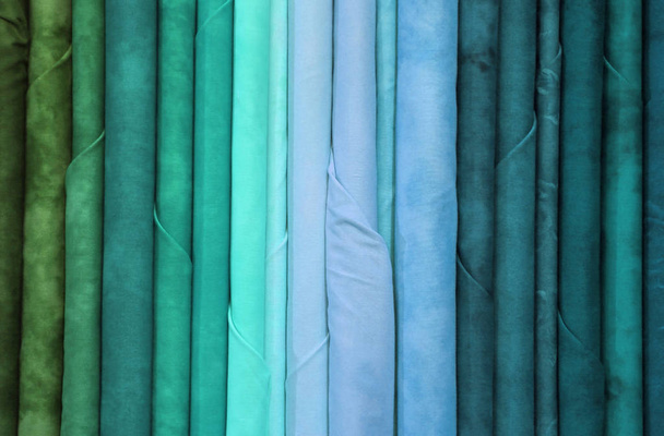 colorful fabrics in the dress shop for dresses or trendy tablecloths - Photo, Image