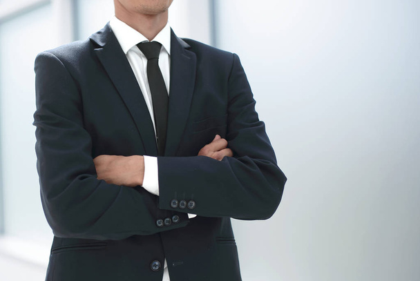 close up.confident businessman standing in the office. - Foto, imagen