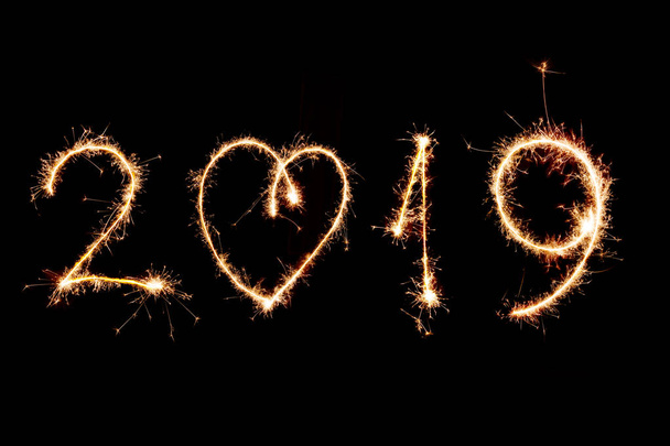 2019 written with Sparkle firework on black background, happy new year 2019 concept. - Fotografie, Obrázek