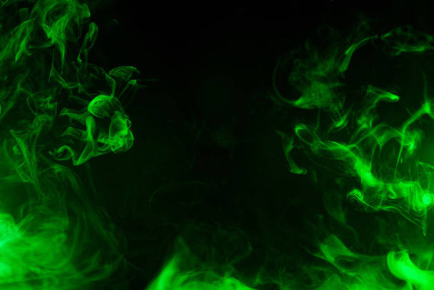 green smoke isolated on black background - Foto, Imagem
