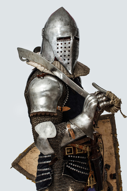 Profile photo of knight with sword on his shoulder - Photo, Image