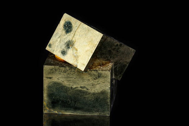 Macro mineral stone Pyrite on a black background close up - Foto, immagini