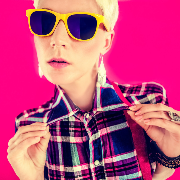 Stylish country girl on a bright pink background - Photo, Image