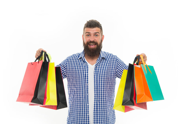 brutal caucasian hipster with moustache. Bearded man with shopping bags.. Shopping sale. Male barber care. Black Friday. Cyber Monday. Mature happy hipster with beard. savings on purchases - Фото, изображение