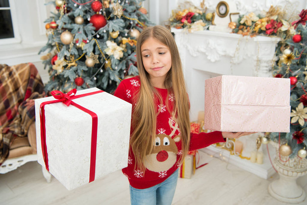 Wishing a happy New Year. Happy new year. Winter. Christmas tree and presents. xmas online shopping. Family holiday. The morning before Xmas. sad little girl. Child enjoy the holiday - Foto, Imagen