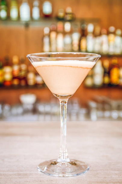 Classic Espresso Martini cocktail at the bar. Luxury resort, restaurant, bar, vacation concept. Vertical - Fotó, kép