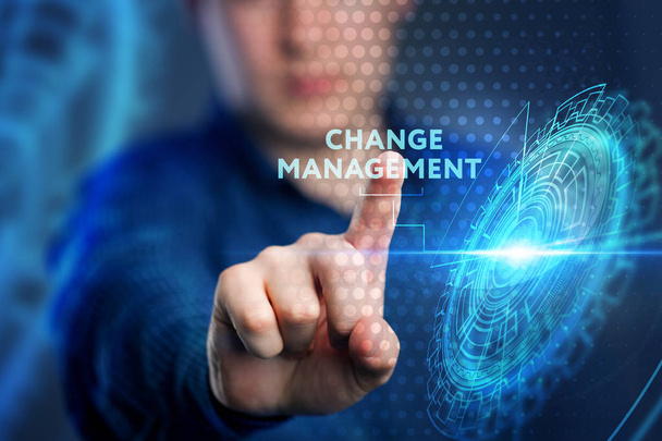 The concept of business, technology, the Internet and the network. A young entrepreneur working on a virtual screen of the future and sees the inscription: Change management  - Foto, Imagem