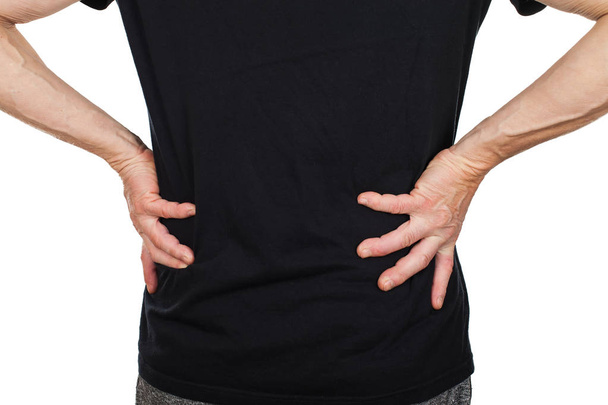 Elderly man suffering from low back pain - Foto, afbeelding