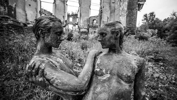 two women covered in dirt posing together outdoors - Φωτογραφία, εικόνα