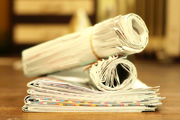 Newspapers folded and rolled, side view   - Photo, Image