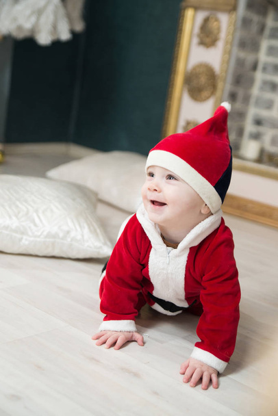 Portrait of smiling baby boy in Santa costume - Φωτογραφία, εικόνα