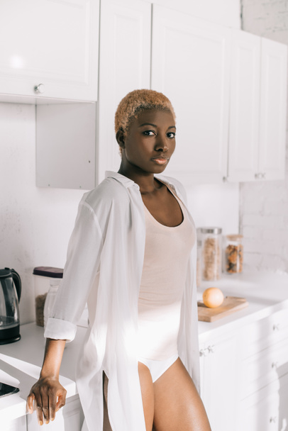 confident african american woman with short hair in pyjamas - Photo, image