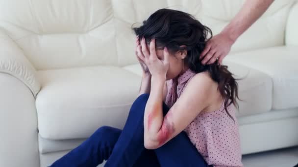 Domestic violence concept. A man attacking to a scared woman at home - Footage, Video