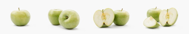 collage of whole and cut green apples on white background - Foto, afbeelding