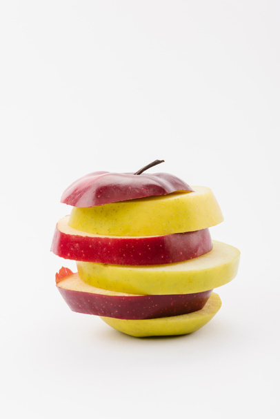 tasty sliced red and golden apples on white background - Foto, imagen