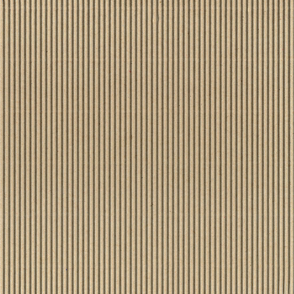 Brown corrugated cardboard texture useful as a background, soft pastel colour - Photo, Image