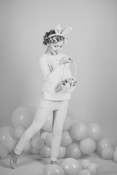 Easter, little girl in bunny ears with balloons. - Fotoğraf, Görsel