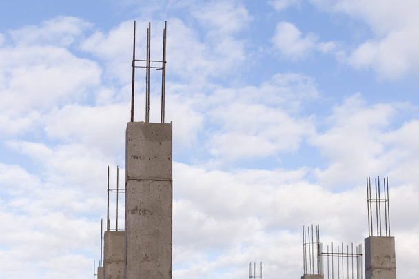 construction site with new concrete columns reinforcing steel - Foto, Imagem