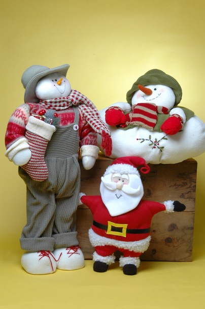 mies lahjoja, lumiukko ja joulupukki
 - Valokuva, kuva