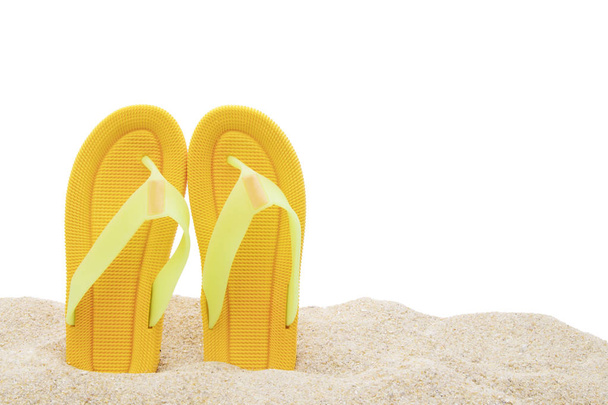 beach scenery with sandals in the sand - Φωτογραφία, εικόνα