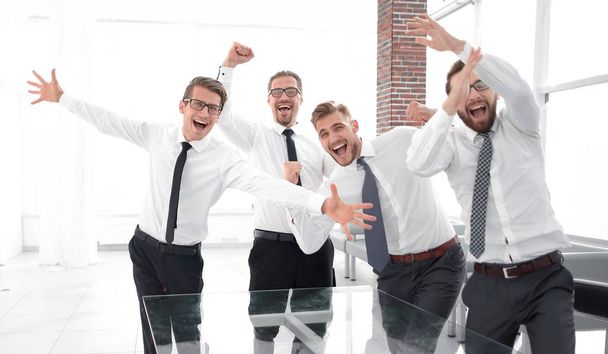 cheering business team in a modern office. - Photo, Image