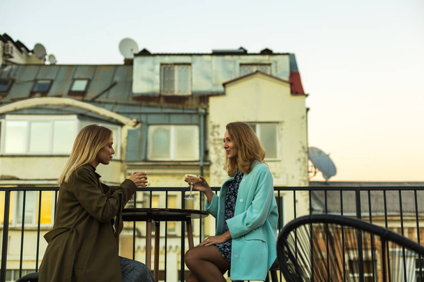 Girls in cafe on rooftop - Photo, Image