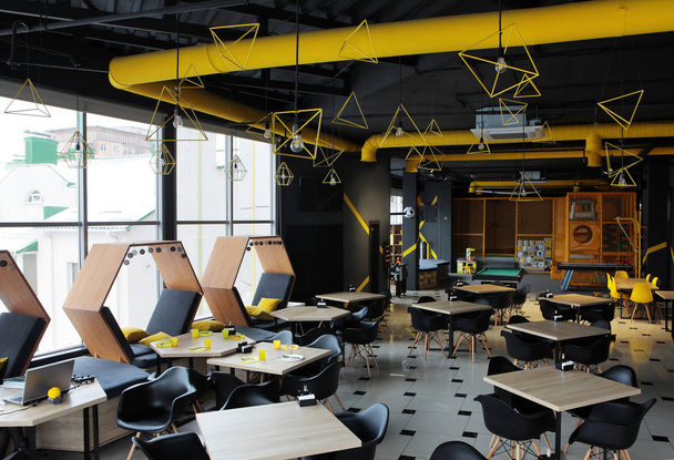 Дизайн інтер'єру промислового цементу лофт концепція сучасного кафе, стриманість. З місцем для дітей
 - Фото, зображення