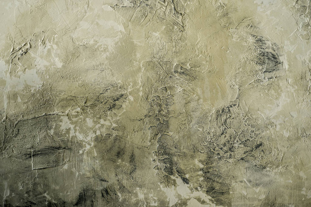 Complex, incomprehensible, original and interesting texture, pattern and background of unevenly laid old and vintage plaster and concrete solution with stains and strokes. - Фото, изображение